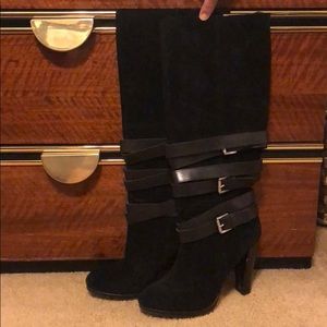 Black knee high heeled boots